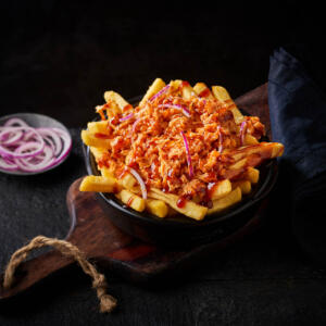 Loaded fries met pulled chicken